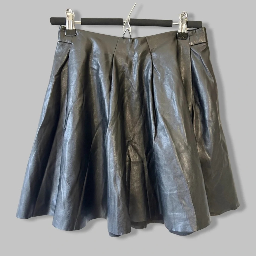 Bebe Black Faux Leather Pleated Mini Circular Skirt